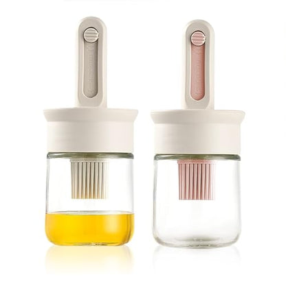 2 Pack Oil Dispenser with Brush, Glass Olive Oil Dispenser Bottle with Telescoping Silicone Basting Brush and Locked Lid for Kitchen Cooking Vinegar Sauce BBQ Grill Frying (White+Pink)