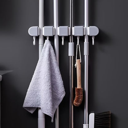 Multi-Functional Mop Broom Holder - No-Drill Wall-Mounted Rack with Strong Adhesive & Elastic Silicone Clips& Hooks for Bathroom/Kitchen