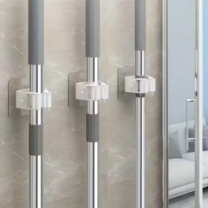 4 Pack No-Drill Adhesive Wall-Mounted Mop & Broom Holder, Space-Saving Bathroom Organizer with Strong Adhesive Clips, Plastic Storage Rack for Toilet Brush, Mop, Broom, White